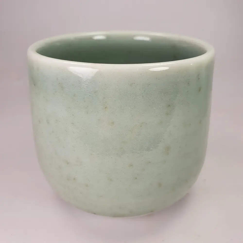 Bol céladon sur porcelaine